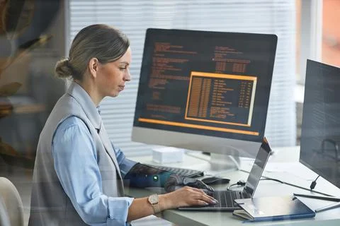 Software Developer Coding on Laptop 写真素材