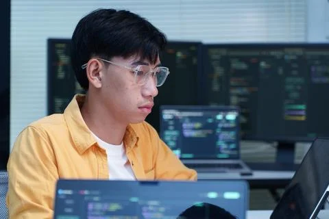 Software Developer Coding in Modern Technology Workspace Fotos Stock