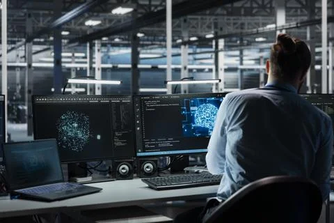 Software developer in data center optimizing hardware for AI tasks 写真素材