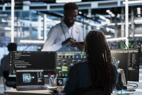 Software developer in data center uses AI for machine learning workloads Stock Photos