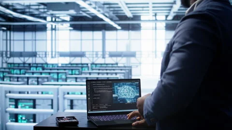 Software developer in data center using artificial intelligence Stock Footage 277647893