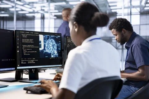 Software developer in data center using artificial intelligence Stock Photos