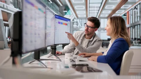 Software Developer Discussing CRM Features During Meeting 스톡 동영상 332500940