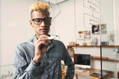 Software developer drawing block scheme Stock Photos