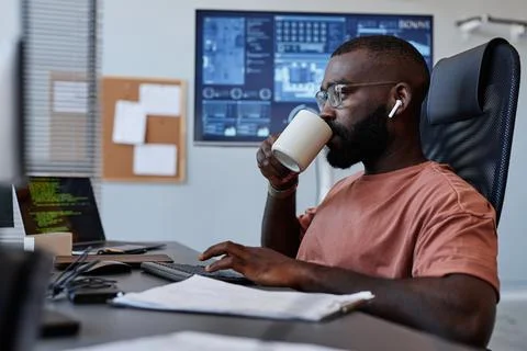 Software Developer Drinking Coffee Foto stock