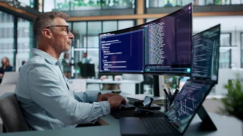 Software Developer Efficiently Coding In A Cloud-based Web Environment Stock Footage 345317553