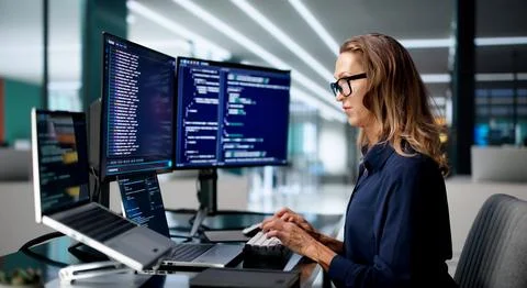 Software Developer Focused On Coding Secure Cloud Applications Stock Photos