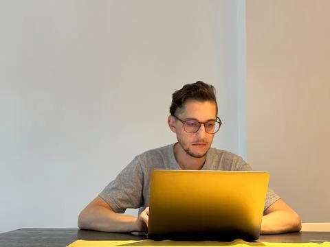 The software developer is focused on the work, front view. Foto stock