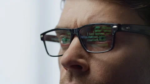 Software developer glasses reflecting terminal code closeup. It man hacker work Stock Footage 242982880