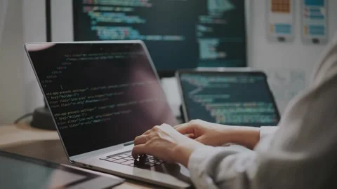 Software developer hands typing data coding programming javascript with laptop Stock-Footage 334586560