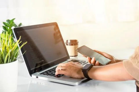 Software developer hands typing data coding programming javascript with lapto Foto stock