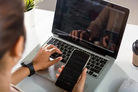 Software developer hands typing data coding programming javascript with laptop 写真素材