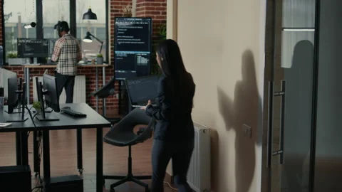 Software developer holding laptop with source code algorithm entering Stock Footage 168240936