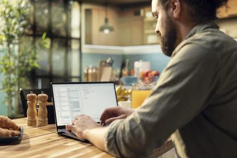 Software developer at home, writing code and debugging applications, engineering Stock Photos
