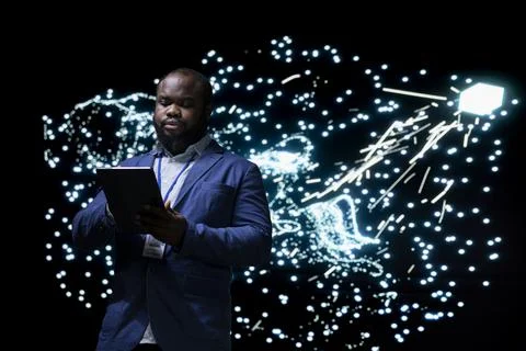 Software developer implementing AI deep learning algorithms using tablet 스톡 사진