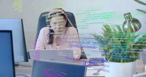 Software developer initiating code review on laptop with code overlay, typing Stock Footage 314868309