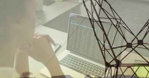 Software developer leaning forward at desk interacting with laptop code display Stock Footage 307885896