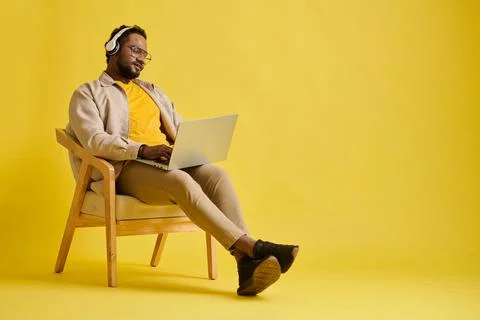 Software Developer Listening to Music Stock Photos