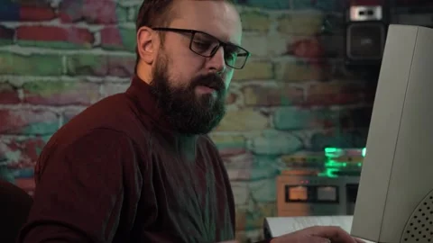 Software Developer or Programmer From 1980's Smoking Cigarette and Talking Video stock 306131683