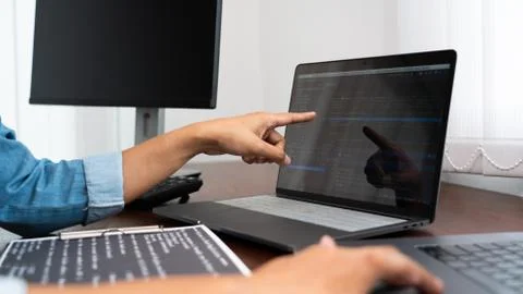 Software developer or programmer working data debugging improvement binary al Foto stock