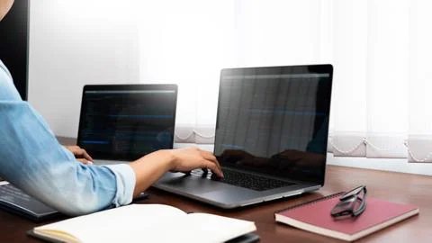 Software developer or programmer working data debugging improvement binary .. Stock Photos