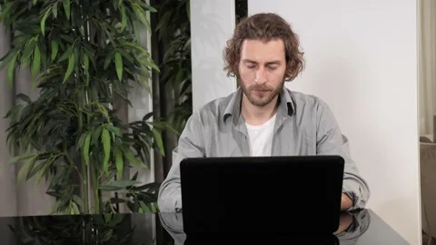 Software developer programmer finding problem solution, writing code on laptop. Stock Footage 167212846