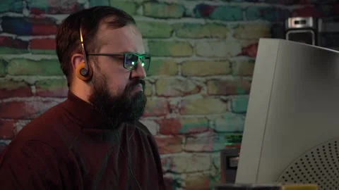 Software Developer, Programmer of Hacker From 1980's Listening Music and Stock Footage 306366947