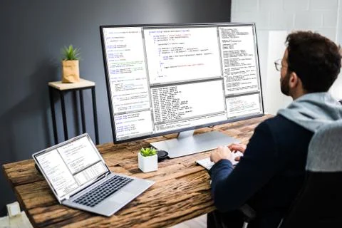 Software Developer Programmer Using Computer Stock Photos