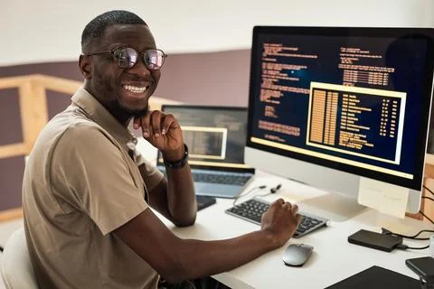 Software Developer Programming on Computer Stock Photos