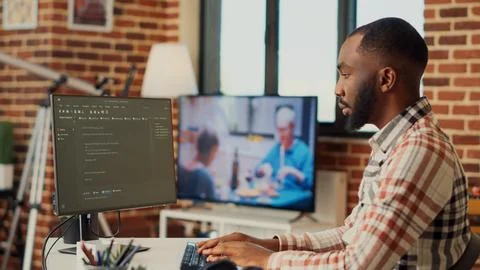 Software developer programming html code on computer Stock Photos