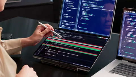 Software Developer Reviews Code Differences Stock Footage 337641700