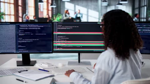 Software Developer Reviews Code Differences Using Visual Merge Tool Stock Footage 339911399