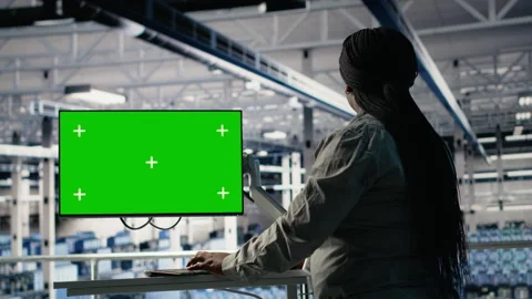 Software developer in server hub using chroma key workstation Stock Footage 314803654