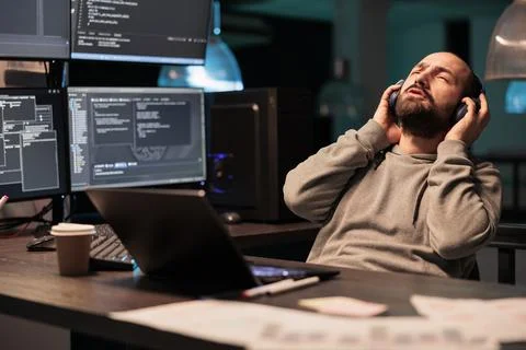 Software developer singing song in office 스톡 사진