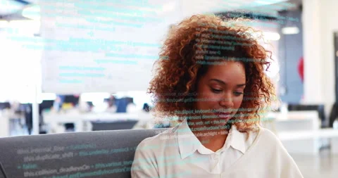 Software developer sitting on couch opening code on tablet activating Stock Footage 314368683