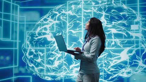 Software developer solving tasks on laptop, running artificial intelligence 写真素材