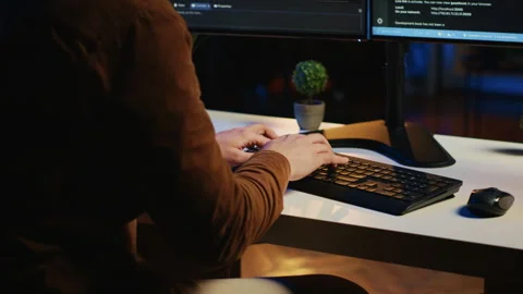 Software developer spamming malfunctioning keyboard buttons, close up Stock Footage 265514117