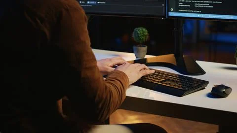 Software developer spamming malfunctioning keyboard buttons, close up 库存照片