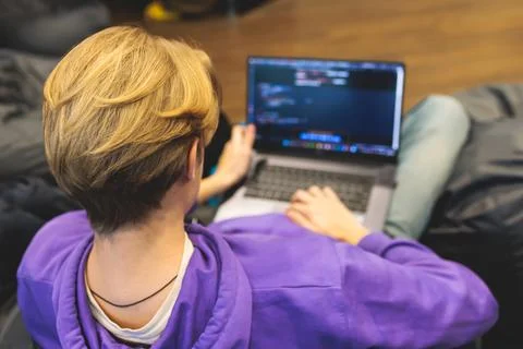 Software developer students in auditorium hall working on computer and lapt.. 스톡 사진