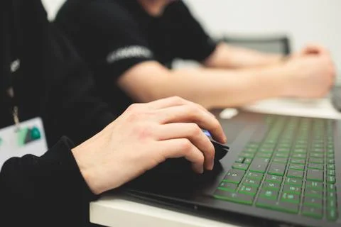Software developer students in auditorium hall working on computer and lapt.. 스톡 사진