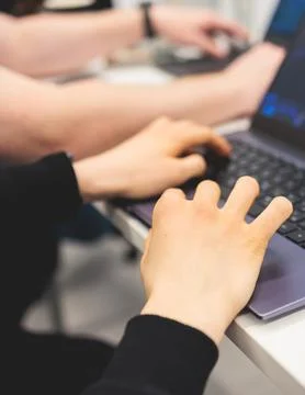 Software developer students in auditorium hall working on computer and lapt.. 스톡 사진