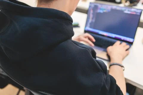 Software developer students in auditorium hall working on computer and lapt.. Foto stock