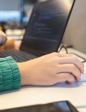 Software developer students in auditorium hall working on computer and lapt.. 스톡 사진
