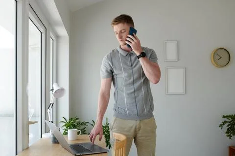 Software Developer Talking on Phone 스톡 사진
