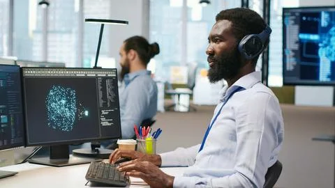 Software developer testing generative AI machine learning algorithms Stock Photos