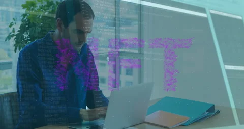 Software developer typing code on laptop in office, showing animated code Stock Footage 309098198