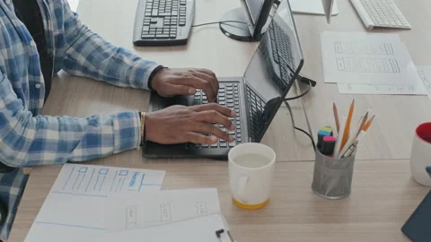 Software Developer Typing on Laptop in Office Stock Footage 203743114