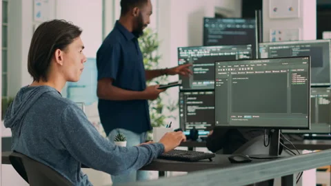 Software developer typing learning app code on computer Stock Footage 231450104