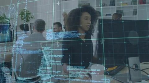 Software developer typing at tech office as code overlays cascading on monitor Stock Footage 319853262
