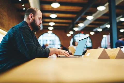Software developer updating data programs during online remote work Stock Photos
